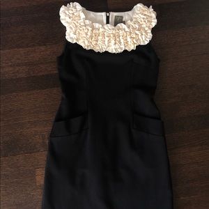 Black cocktail dress with rushed cream collar